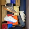 The photo shows a package with footwear in the category CS.