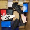 The photo shows a package with footwear in the category CS.