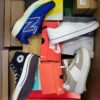 The photo shows a package with footwear in the category CS.