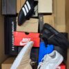 The photo shows a package with footwear in the category CS.