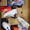 The photo shows a package with footwear in the category CS.