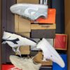 The photo shows a package with footwear in the category CS.