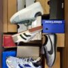 The photo shows a package with footwear in the category CS.