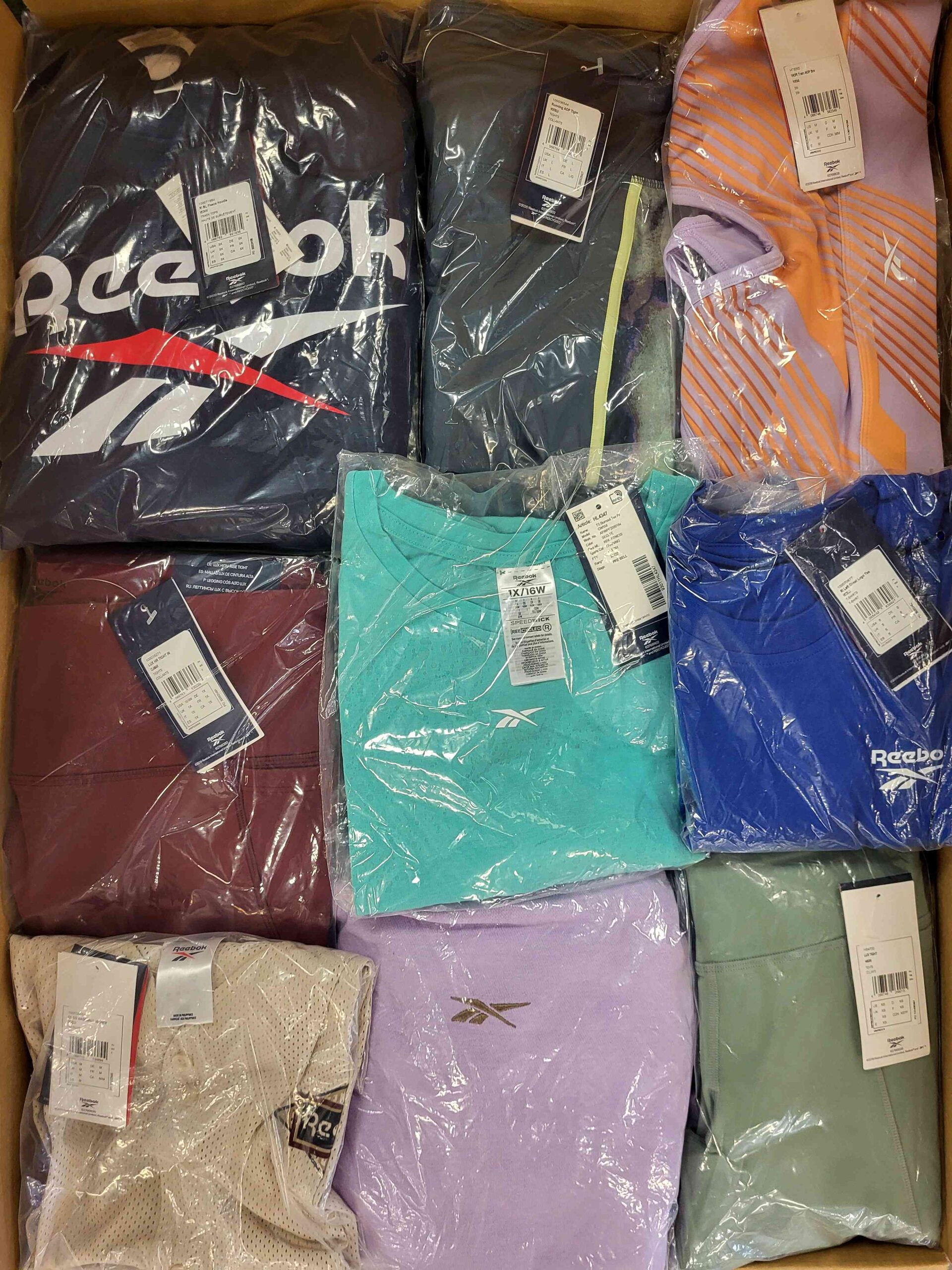 The photo shows a package with clothing in the category R.