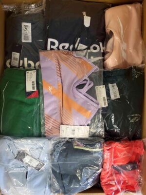 The photo shows a package with clothing in the category R.