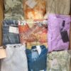 The photo shows a package with clothing in the category AR.