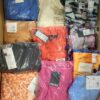 The photo shows a package with clothing in the category AR.