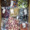 The photo shows a package with clothing in the category AR.