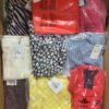 The photo shows a package with clothing in the category AR.