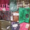 The photo shows a package with clothing in the category AR.