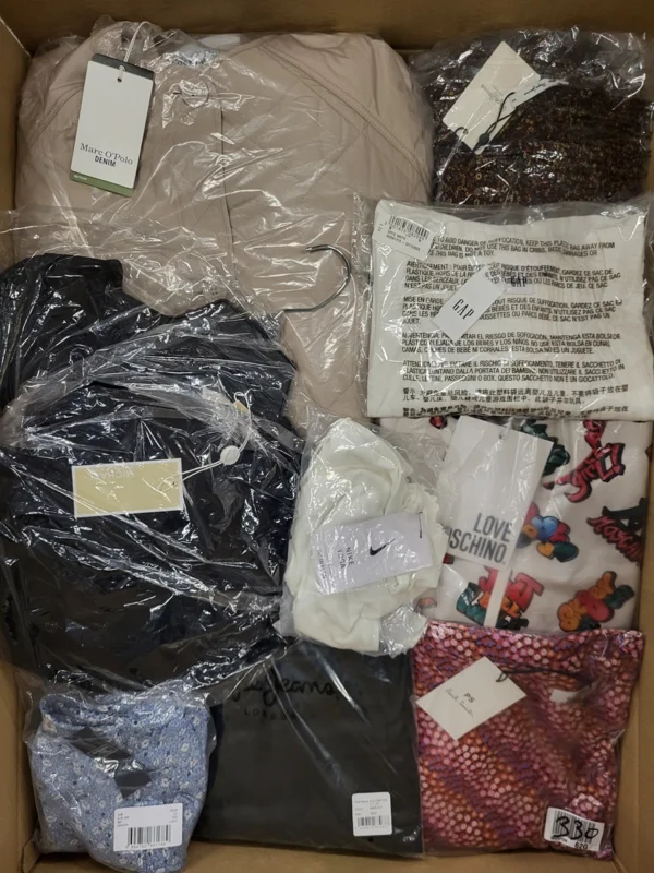 The photo shows a package with clothing in the category AW.