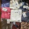The photo shows a package with clothing in the category AR.