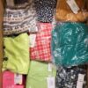The photo shows a package with clothing in the category AR.