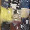The photo shows a package with clothing in the category AW.