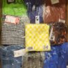The photo shows a package with clothing in the category AR.