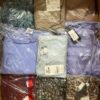 The photo shows a package with clothing in the category AR.