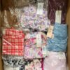 The photo shows a package with clothing in the category AR.