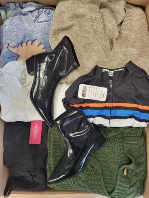 The photo shows a package with clothing in the category BSN.
