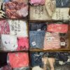 The photo shows a package with clothing in the category BPSDV.