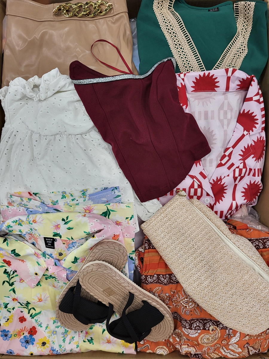 The photo shows a package with clothing in the category SN.