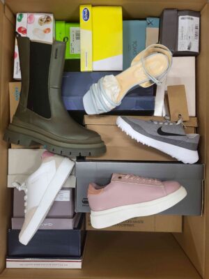The photo shows a package with footwear in the category AS.