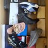 The photo shows a package with footwear in the category AS.