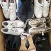 The photo shows a package with footwear in the category SH.