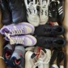 The photo shows a package with footwear in the category SH.