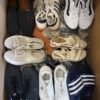 The photo shows a package with footwear in the category CSU.