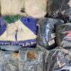 The photo shows a package with clothing in the category D.