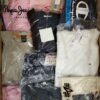 The photo shows a package with clothing in the category B.