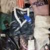 The photo shows a package with clothing in the category B.