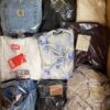 The photo shows a package with clothing in the category B.