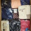 The photo shows a package with clothing in the category B.
