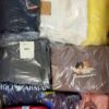 The photo shows a package with clothing in the category B.