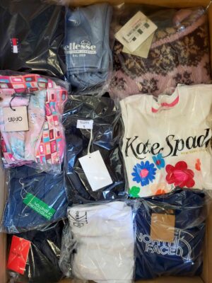 The photo shows a package with clothing in the category B.