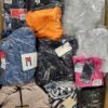The photo shows a package with clothing in the category B.