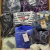 The photo shows a package with clothing in the category B.