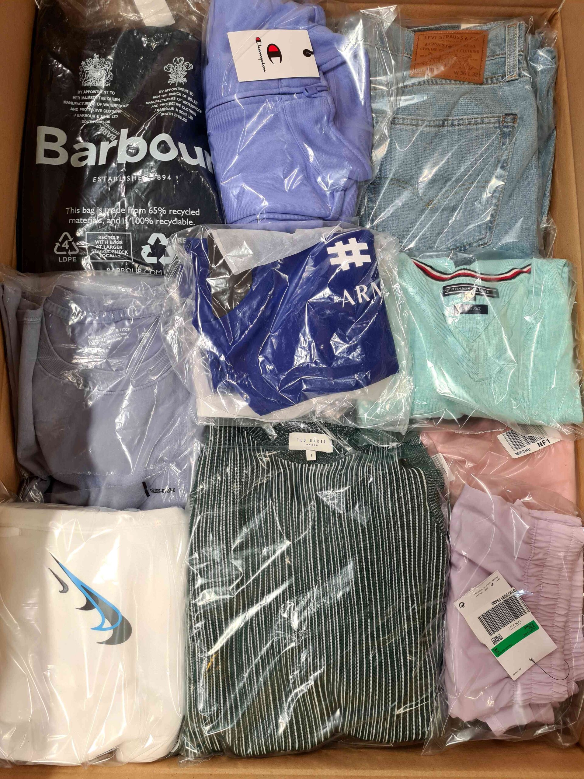The photo shows a package with clothing in the category B.