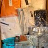 The photo shows a package with clothing in the category B.