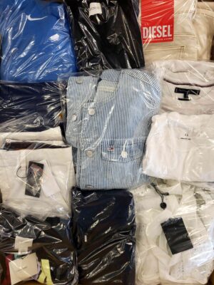 The photo shows a package with clothing in the category C.