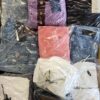 The photo shows a package with clothing in the category C.