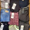 The photo shows a package with clothing in the category U.