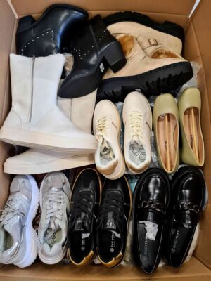 The photo shows a package with clothing in the category BPS.