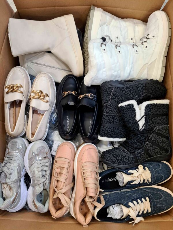 The photo shows a package with clothing in the category BPS.