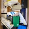 The photo shows a package with footwear in the category BS.