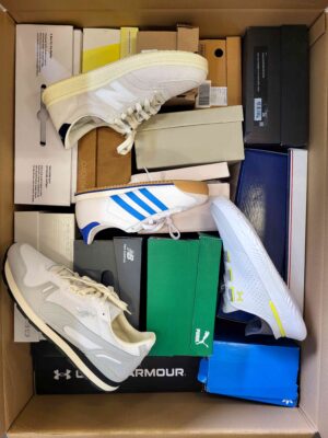 The photo shows a package with footwear in the category BS.