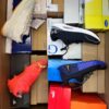 The photo shows a package with footwear in the category BS.