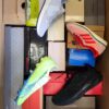 The photo shows a package with footwear in the category BS.
