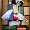 The photo shows a package with footwear in the category BS.